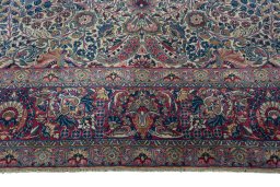 Full view of 1930s Kerman rug from Iran / Persia, 422 × 300 cm in Beige tones