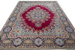 Surface texture of 1970s Kerman rug with natural Wool and intricate pattern