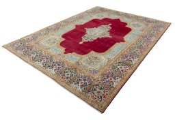 Corner detail of 2000s Kerman rug showing border pattern and Wool pile