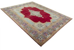 Close-up detail of 2000s Kerman rug from Iran / Persia showing Wool weave