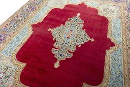 Backside of handmade 2000s Kerman rug showing knot structure and weave density
