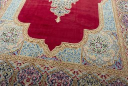 Close-up detail of 2000s Kerman rug from Iran / Persia showing Wool weave