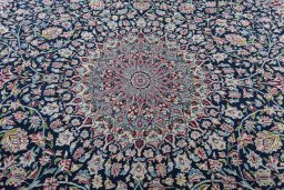 Central medallion detail of 2000s Kerman rug from Iran / Persia