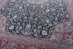 Close-up detail of 2000s Kerman rug from Iran / Persia showing Wool weave