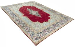 Close-up detail of 2000s Kerman rug from Iran / Persia showing Wool weave