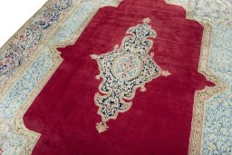 Backside of handmade 2000s Kerman rug showing knot structure and weave density