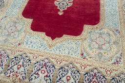 Close-up detail of 2000s Kerman rug from Iran / Persia showing Wool weave