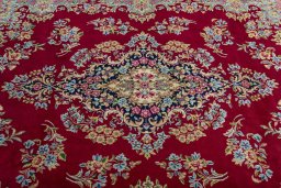 Central medallion detail of 2000s Kerman rug from Iran / Persia
