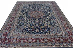 Surface texture of 2000s Kerman rug with natural Wool and intricate pattern