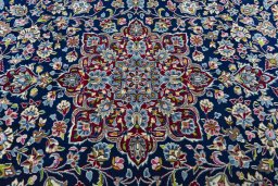 Central medallion detail of 2000s Kerman rug from Iran / Persia