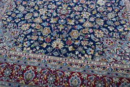 Close-up detail of 2000s Kerman rug from Iran / Persia showing Wool weave