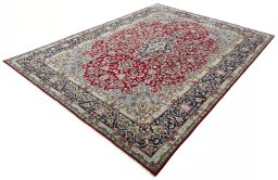Corner detail of 2000s Kerman rug showing border pattern and Wool pile