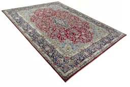 Close-up detail of 2000s Kerman rug from Iran / Persia showing Wool weave