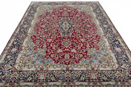 Surface texture of 2000s Kerman rug with natural Wool and intricate pattern