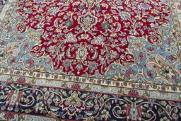 Close-up detail of 2000s Kerman rug from Iran / Persia showing Wool weave