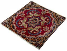Corner detail of 2000s Kerman rug showing border pattern and Wool pile