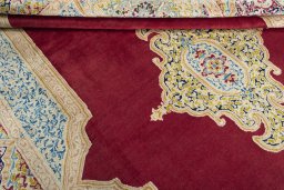 Close-up detail of 2000s Kerman rug from Iran / Persia showing Wool weave