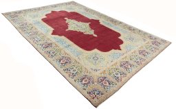 Close-up detail of 2000s Kerman rug from Iran / Persia showing Wool weave