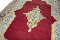 Backside of handmade 2000s Kerman rug showing knot structure and weave density