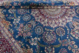Close-up detail of New Kerman rug from Iran / Persia showing Wool weave