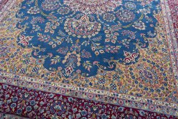 Close-up detail of New Kerman rug from Iran / Persia showing Wool weave