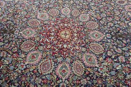 Central medallion detail of 2000s Kerman rug from Iran / Persia