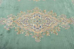 Central medallion detail of 2000s Kerman rug from Iran / Persia
