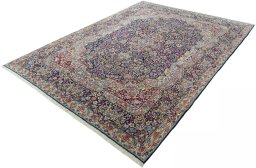 Corner detail of 1970s Kerman rug showing border pattern and Wool pile