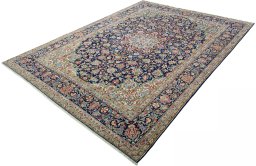 Corner detail of 2000s Kerman rug showing border pattern and Wool pile
