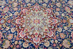 Central medallion detail of 2000s Kerman rug from Iran / Persia
