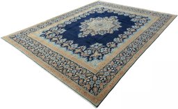 Corner detail of 2000s Kerman rug showing border pattern and Wool pile