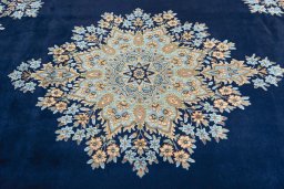 Central medallion detail of 2000s Kerman rug from Iran / Persia