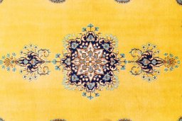 Corner detail of 2000s Kerman rug showing border pattern and Wool pile