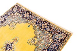 Surface texture of 2000s Kerman rug with natural Wool and intricate pattern