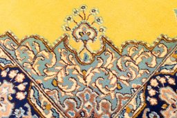 Close-up detail of 2000s Kerman rug from Iran / Persia showing Wool weave