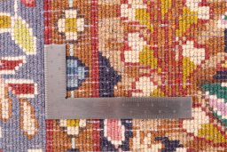 Corner detail of 1980s Kerman rug showing border pattern and Wool pile