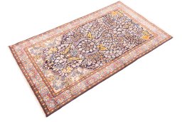 Corner detail of 1980s Kerman rug showing border pattern and Wool pile