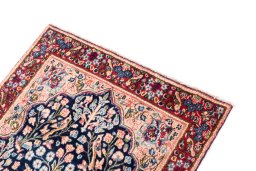 Surface texture of 1970s Kerman rug with natural Wool and intricate pattern