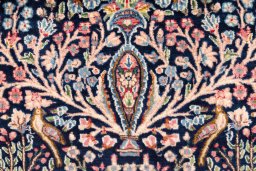 Full view of 1970s Kerman rug from Iran / Persia, 154 × 90 cm in Dark blue tones