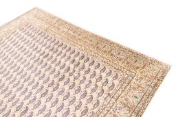 Surface texture of 1980s Kerman rug with natural Wool and intricate pattern