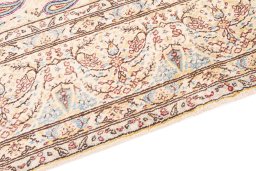 Backside of handmade 1980s Kerman rug showing knot structure and weave density