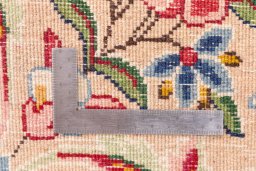 Corner detail of 2005s Kerman rug showing border pattern and Wool pile