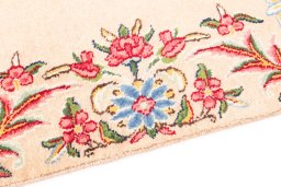 Backside of handmade 2005s Kerman rug showing knot structure and weave density