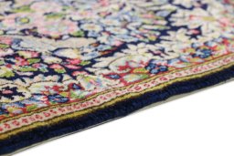 Central medallion detail of 1990s Kerman rug from Iran / Persia