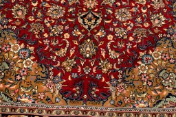 Corner detail of New Kerman rug showing border pattern and Wool pile
