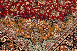 Backside of handmade New Kerman rug showing knot structure and weave density