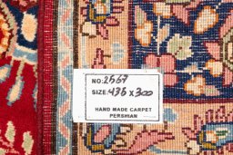 Close-up detail of 1990s Kerman rug from Iran / Persia showing Wool weave