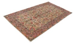 Corner detail of 1920s Kerman rug showing border pattern and Wool pile