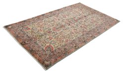 Close-up detail of 1920s Kerman rug from Iran / Persia showing Wool weave