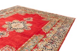 Surface texture of 1990s Kerman rug with natural Wool and intricate pattern